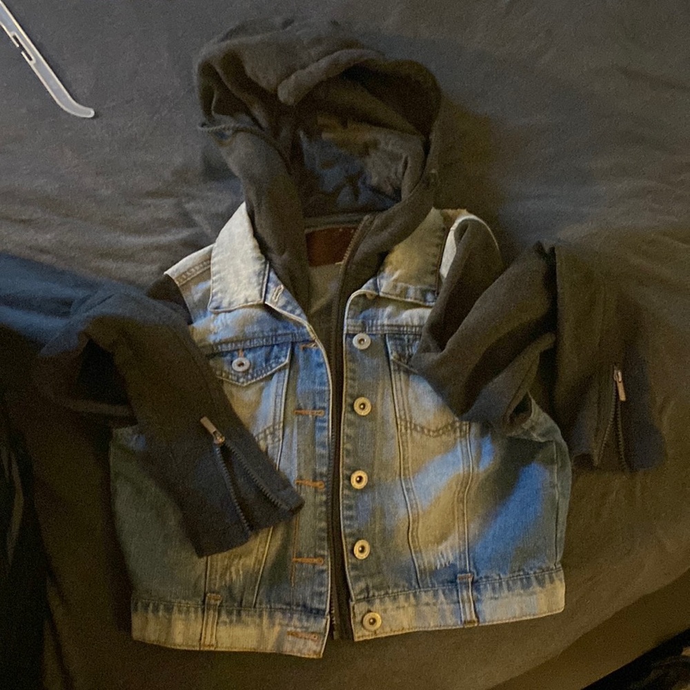 Jean Jacket with hoodie, it says XL but fits like a medium.